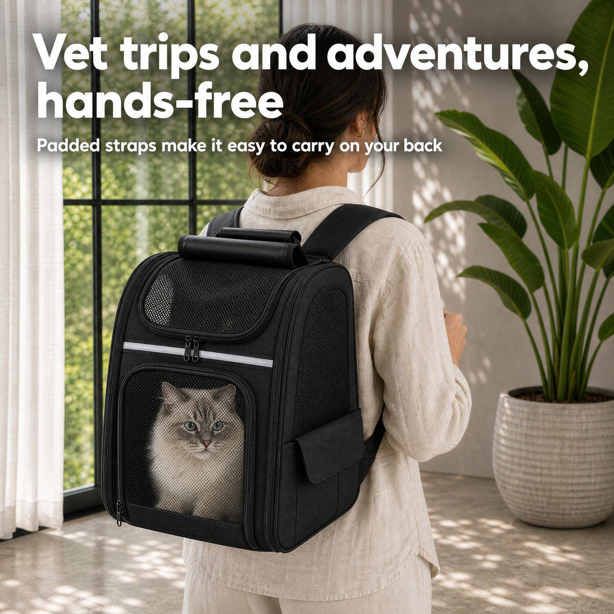 Woman wearing the cat carrier backpack with a Ragdoll cat looking out the front window